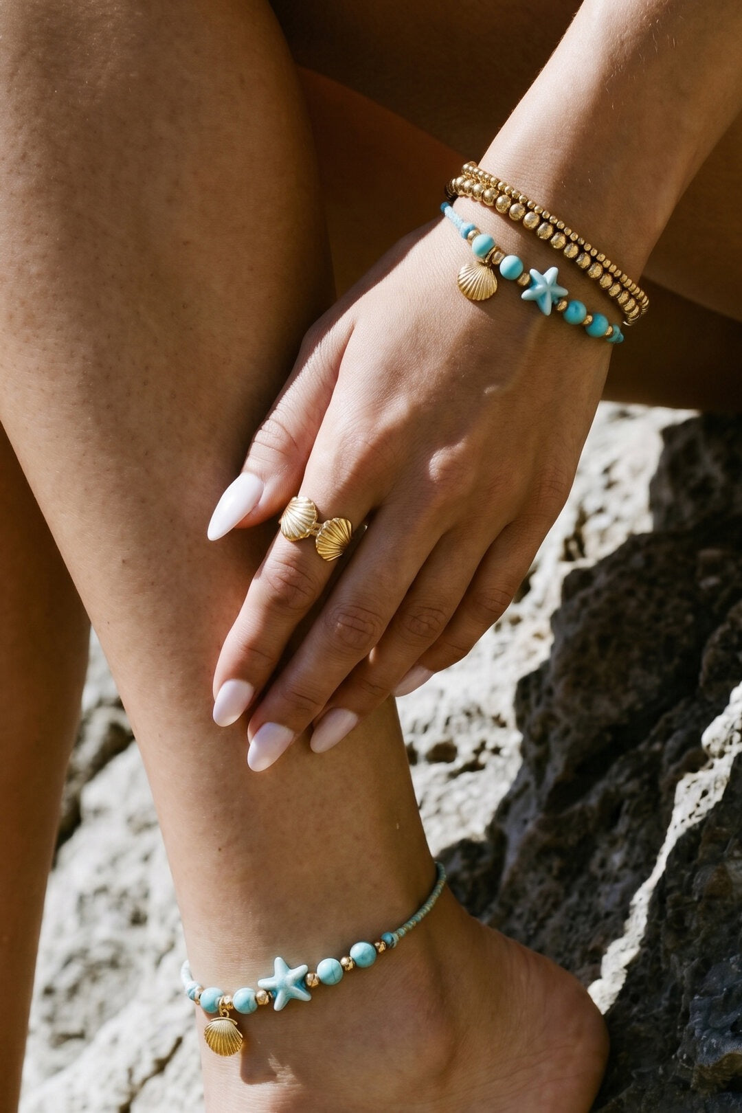 Armband met zeester en schelp