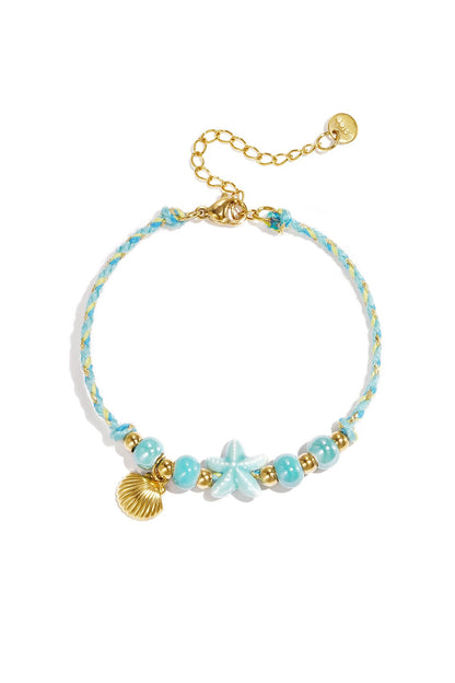 Armband met zeester en schelp