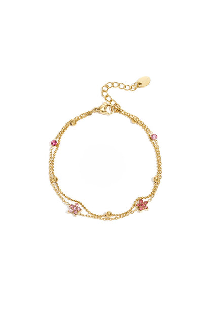 Armband met gekleurde belegde steentjes
