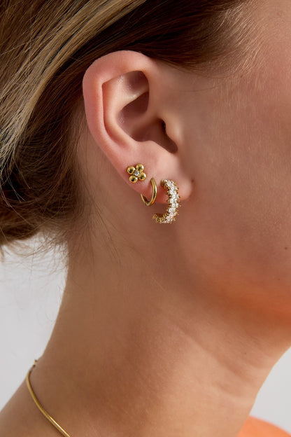 Oorbellen met zigzag steentjes -goud