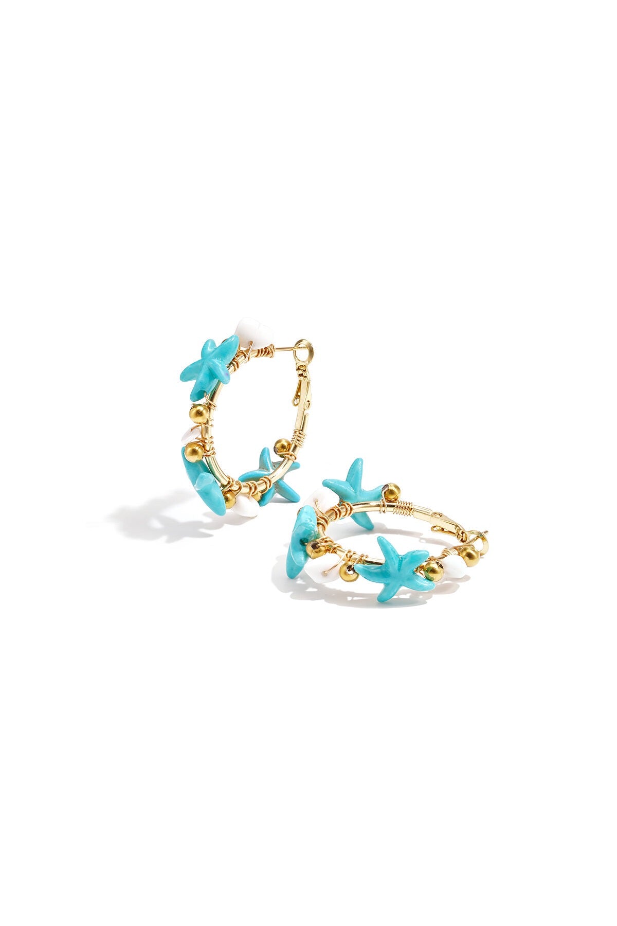 Creolen met zeesterren -babyblauw