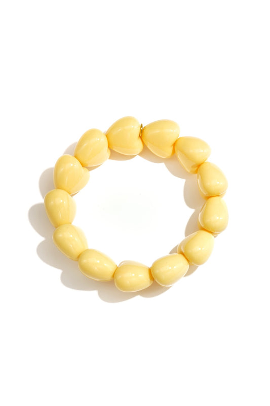Armband met 13 kleine hartjes -geel