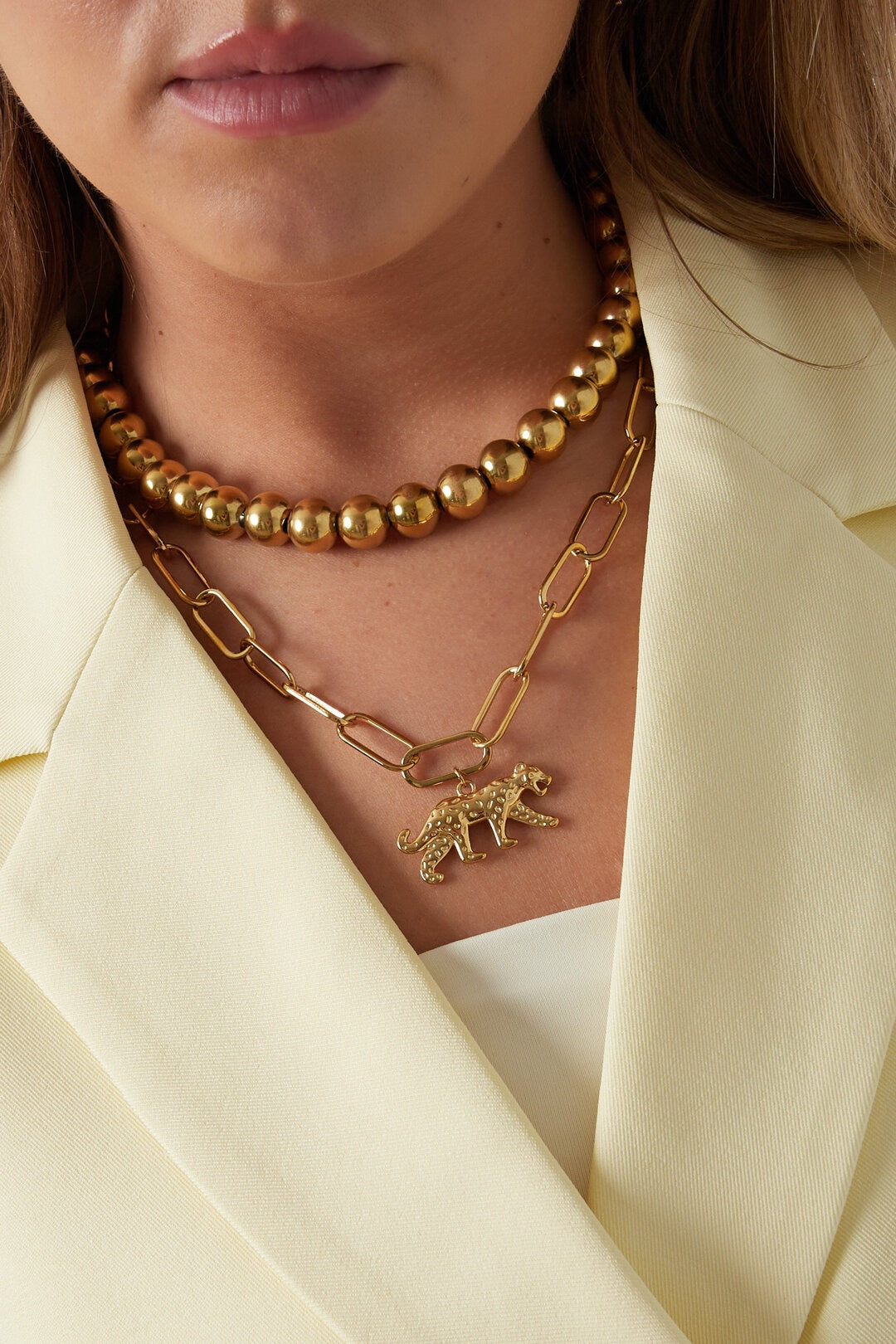 Schakelketting met panterbedel -goud