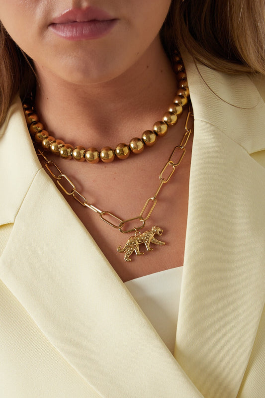 Schakelketting met panterbedel -goud