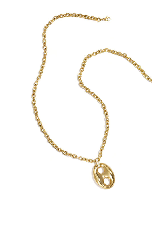 Ketting met statement charm in knoop