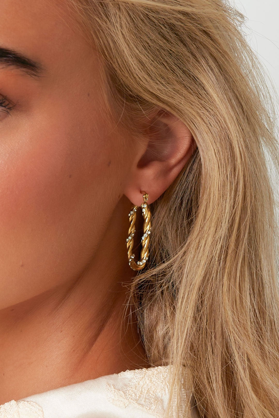 Twisted sparkle hoops - goud